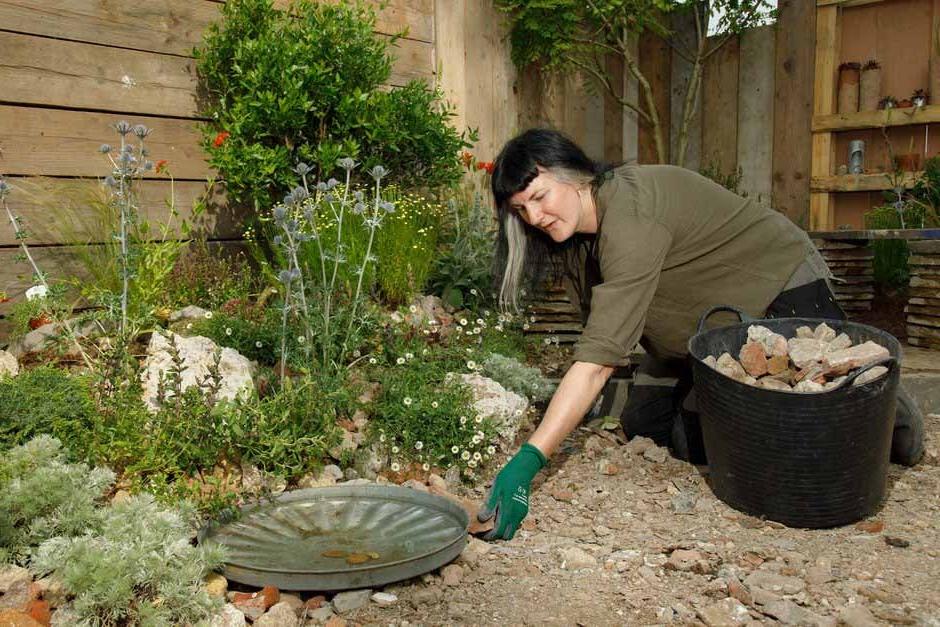 Amanda Grimes working on her Punk Rockery garden