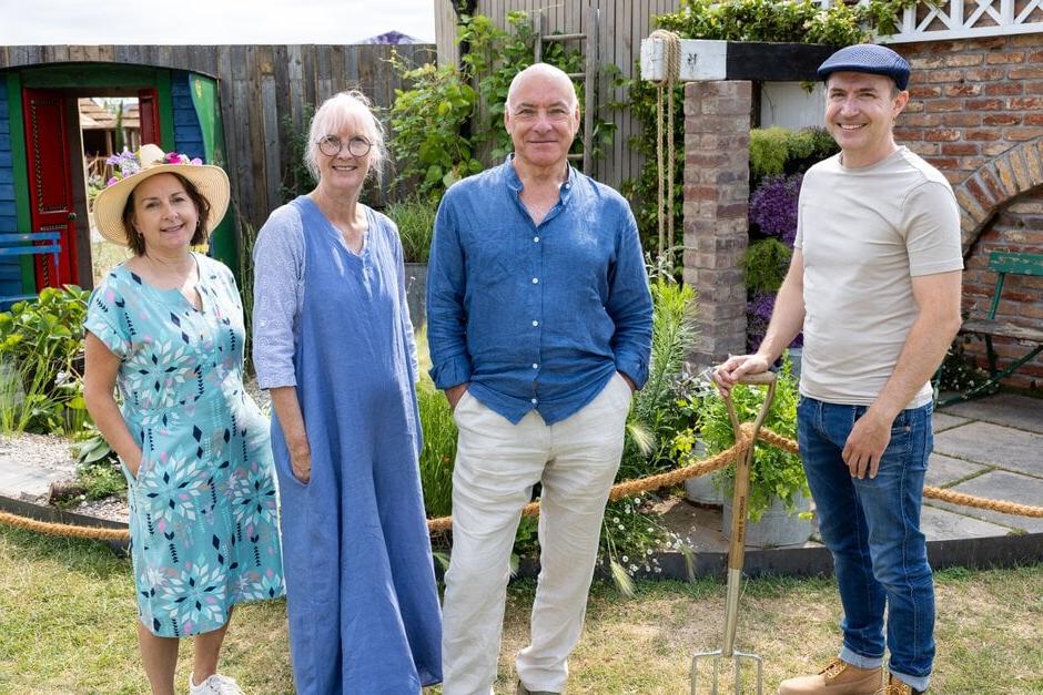 Designers of the RHS and BBC Local Radio Planet-Friendly Garden pose with the garden and mentor Lee Bestall