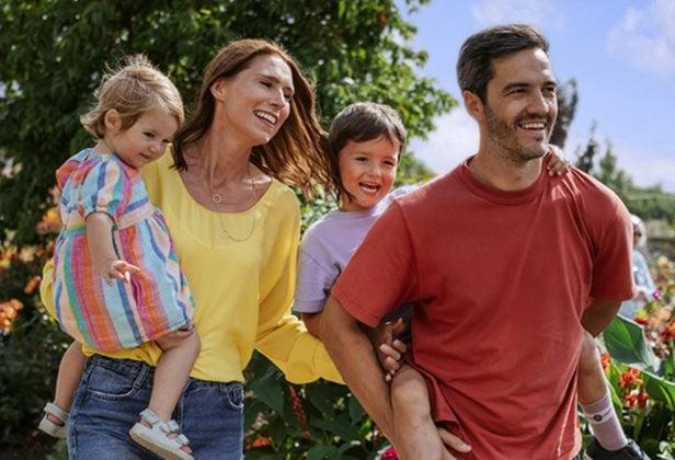 Photo of a family on a summer day walking through RHS Hude Hall