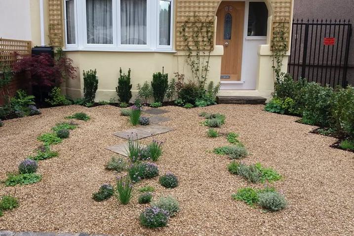 A front-garden can have space for plants and parking