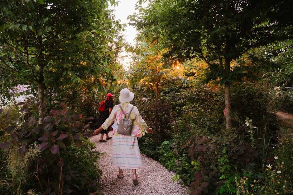 Visitors walk through the Forest Bathing Garden at RHS Hampton Court 2022