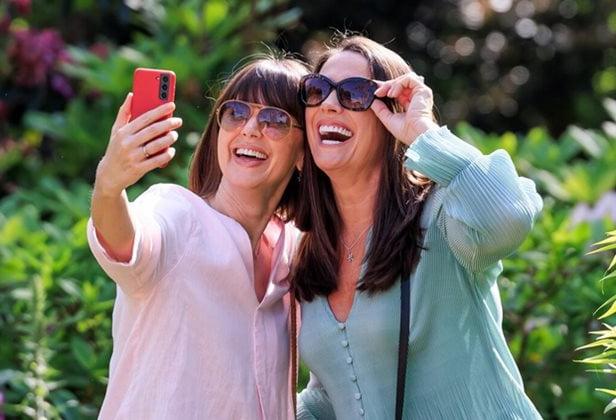 Photo of two women enjoying an RHS garden