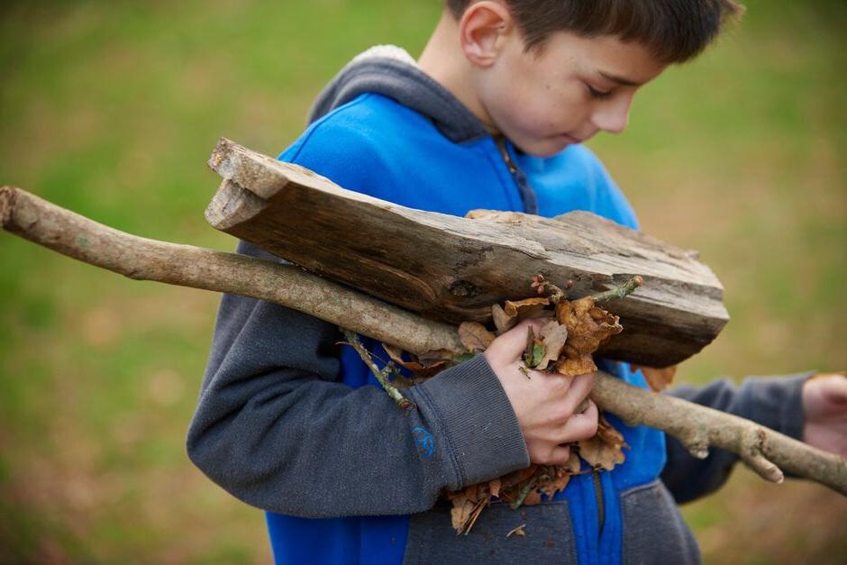 Boy with sticks