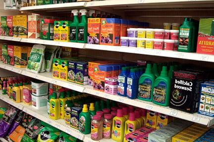 A selection of fertilisers in a garden centre. Image: RHS/Tim Sandall