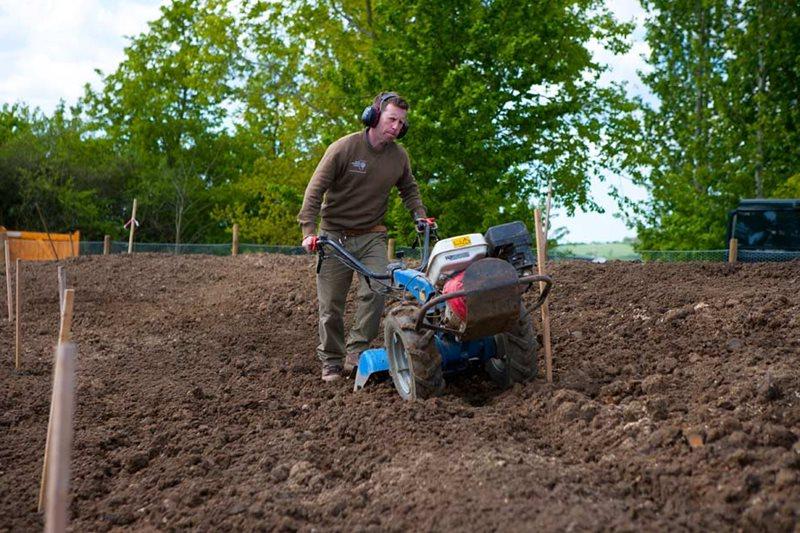 Preparing the soil with heavy machinery