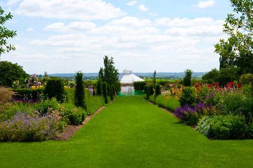 Flower beds with the glasshouse in the distance